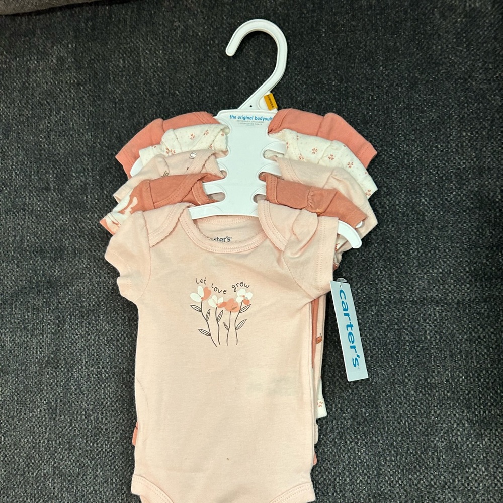 New Carters original bodysuits for newborn/infants.  6-9 pounds